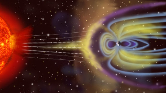 Disegno che riproduce la magnetosfera della Terra, la parte azzurra subito all'interno della viola  la magnetopausa