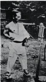 Gichin Funakoshi at the Makiwara